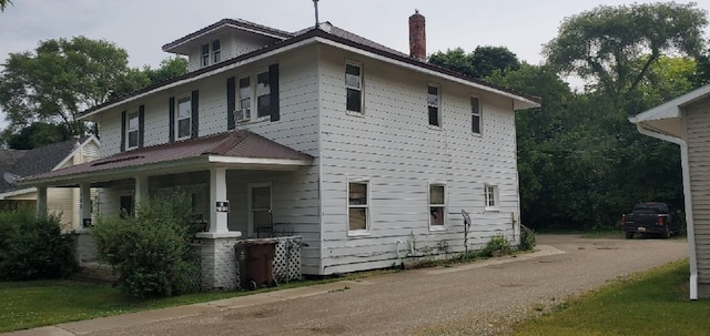 708 N Main St, Mount Pleasant, MI 48858 - view of property exterior featuring a porch