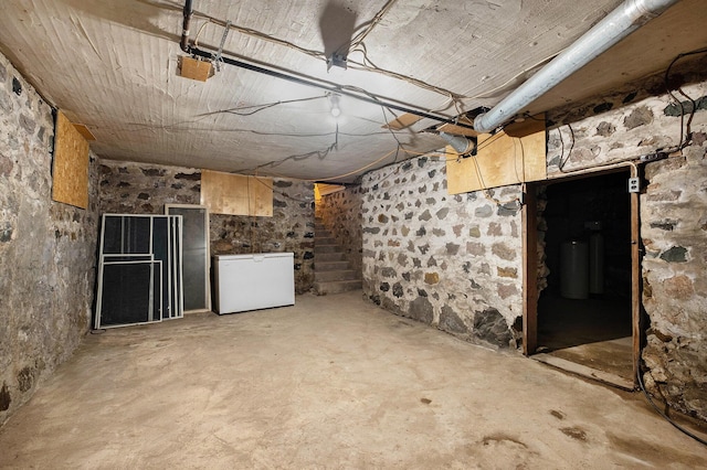 13872 Hastings Rd, Freeport, MI 49325 - unfinished basement featuring fridge