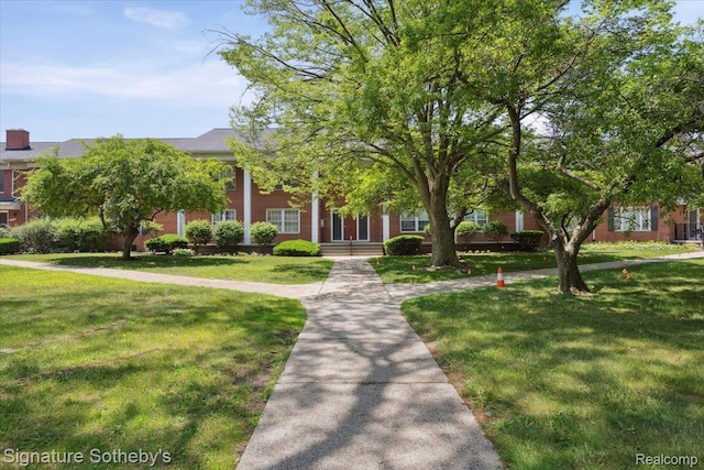 27671 W Echo Vly, Farmington Hills, MI 48334 - view of front of house featuring a front yard and brick siding
