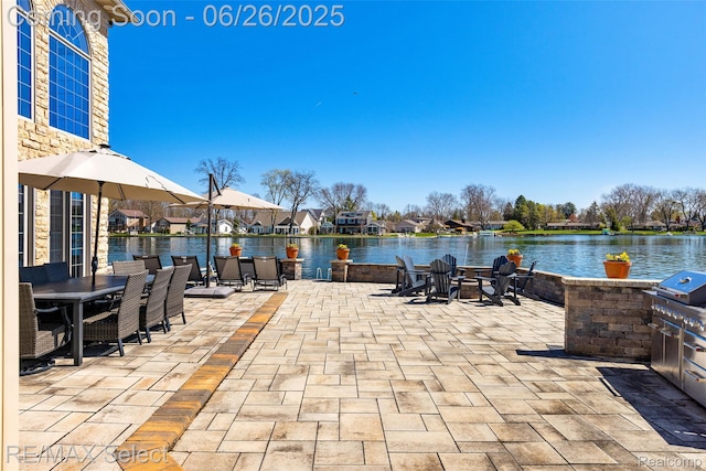 13229 Enid Blvd, Fenton, MI 48430 - view of patio featuring a water view