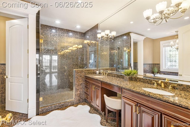 13229 Enid Blvd, Fenton, MI 48430 - full bath with a chandelier, a shower stall, double vanity, a garden tub, and recessed lighting