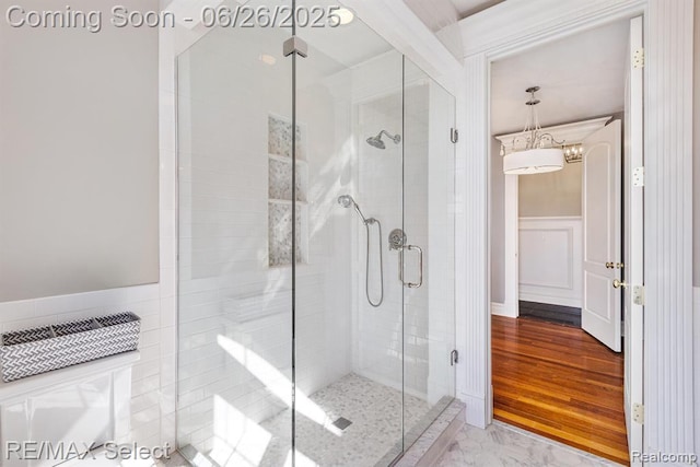 13229 Enid Blvd, Fenton, MI 48430 - full bathroom with a shower stall and wainscoting