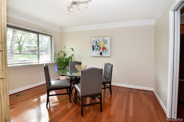 142 E Hickory Grove Rd Unit 3, Beverly Hills, MI 48304 - dining space featuring crown molding and wood finished floors
