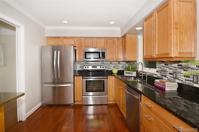 142 E Hickory Grove Rd Unit 3, Beverly Hills, MI 48304 - kitchen with stainless steel appliances, dark wood finished floors, crown molding, tasteful backsplash, and dark stone counters