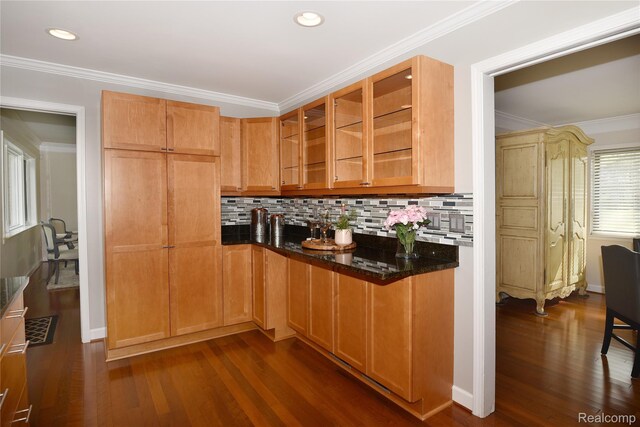 142 E Hickory Grove Rd Unit 3, Beverly Hills, MI 48304 - kitchen featuring backsplash, dark wood-style floors, crown molding, glass insert cabinets, and dark stone counters
