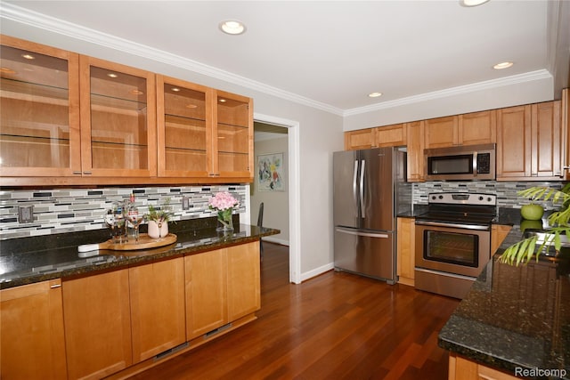142 E Hickory Grove Rd Unit 3, Beverly Hills, MI 48304 - kitchen featuring stainless steel appliances, decorative backsplash, dark stone counters, dark wood-type flooring, and glass insert cabinets