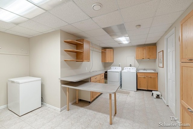 175 Honey Creek Ave NE, Ada, MI 49301 - washroom featuring cabinet space and washing machine and dryer