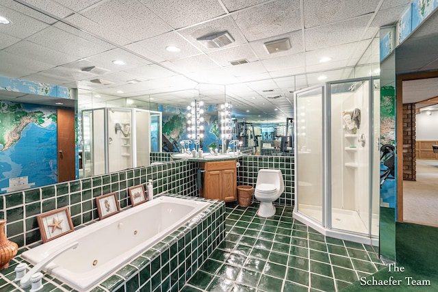 175 Honey Creek Ave NE, Ada, MI 49301 - full bath with a stall shower, a tub with jets, vanity, tile patterned floors, and a drop ceiling