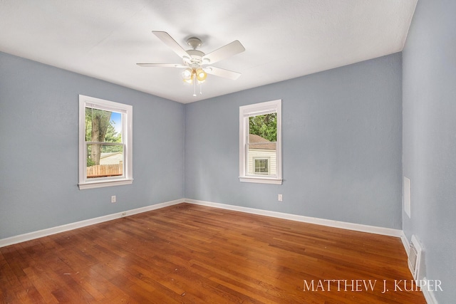 1512 Werner Ave NW, Grand Rapids, MI 49534 - empty room with wood finished floors and ceiling fan