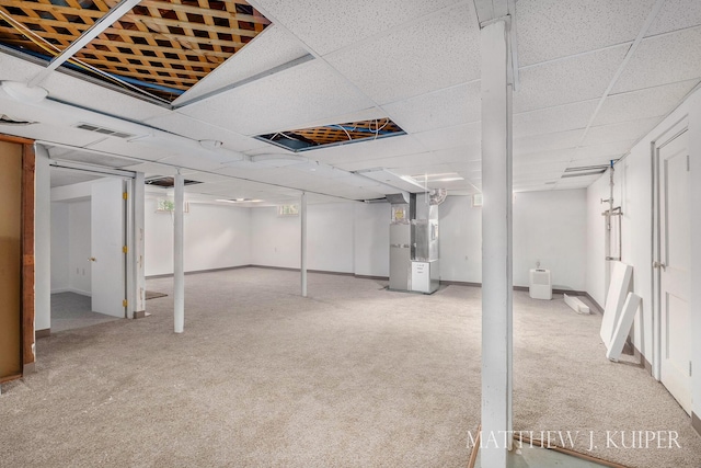 1512 Werner Ave NW, Grand Rapids, MI 49534 - finished below grade area featuring heating unit and carpet floors