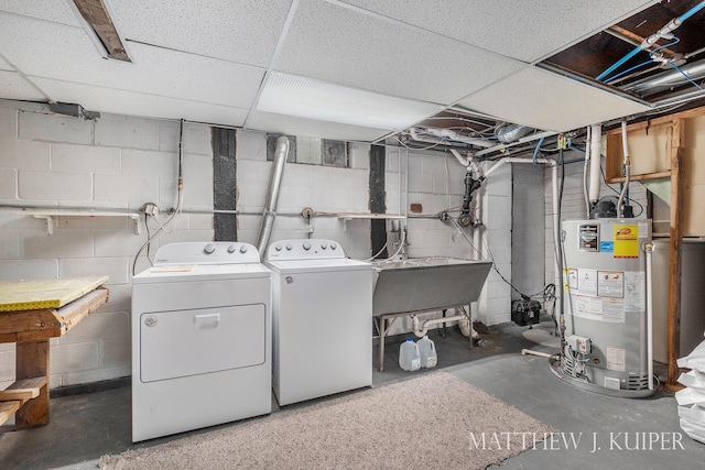 1512 Werner Ave NW, Grand Rapids, MI 49534 - laundry room with water heater and separate washer and dryer