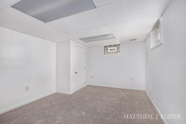 1512 Werner Ave NW, Grand Rapids, MI 49534 - basement with carpet flooring and a paneled ceiling