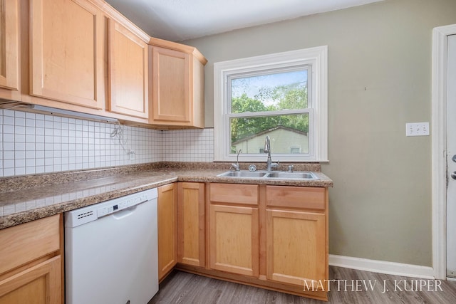 1512 Werner Ave NW, Grand Rapids, MI 49534 - kitchen with white dishwasher, light brown cabinetry, decorative backsplash, and wood finished floors
