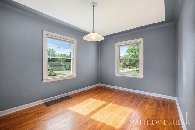 1512 Werner Ave NW, Grand Rapids, MI 49534 - empty room with hardwood / wood-style flooring