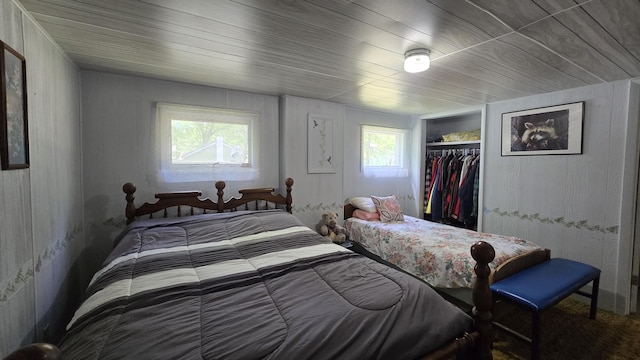 1686 Oak St, Wellston, MI 49689 - bedroom featuring a closet and wooden ceiling
