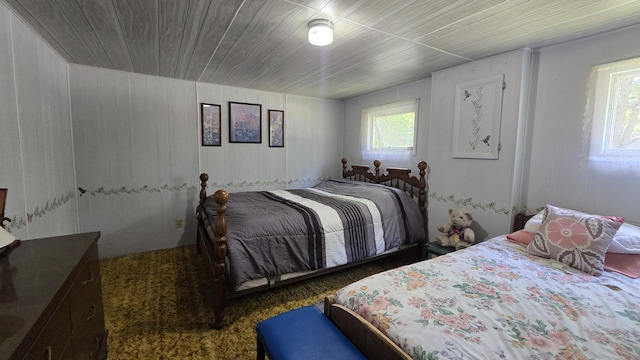 1686 Oak St, Wellston, MI 49689 - bedroom with multiple windows and wood ceiling