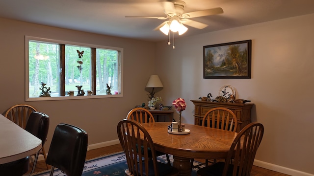 1686 Oak St, Wellston, MI 49689 - dining room with a ceiling fan and wood finished floors