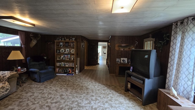 1686 Oak St, Wellston, MI 49689 - living room with wooden walls and carpet