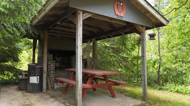 1686 Oak St, Wellston, MI 49689 - view of patio featuring a view of trees