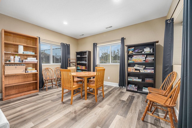 7068 Jasper Dr, Hudsonville, MI 49426 - dining room featuring wood finished floors and recessed lighting