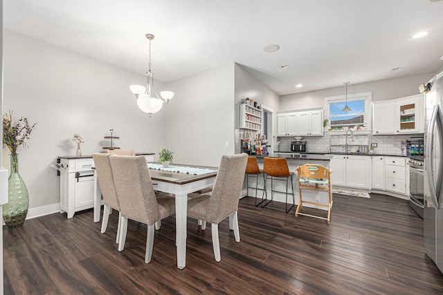 7068 Jasper Dr, Hudsonville, MI 49426 - dining space with dark wood-type flooring and recessed lighting