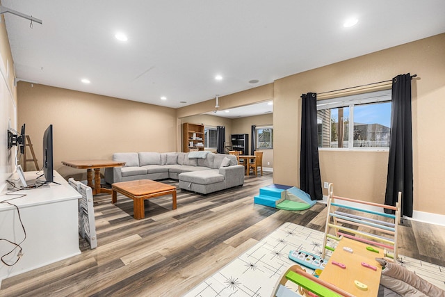 7068 Jasper Dr, Hudsonville, MI 49426 - living area featuring light wood-type flooring and recessed lighting