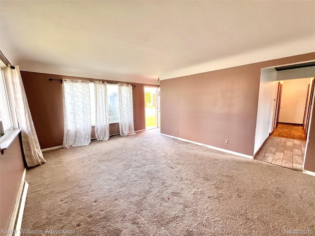 913 Cameron Ave, Pontiac, MI 48340 - spare room featuring carpet floors and baseboards