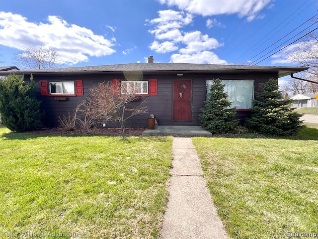 913 Cameron Ave, Pontiac, MI 48340 - view of front facade with a front lawn and a chimney