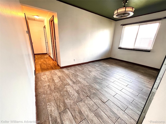 913 Cameron Ave, Pontiac, MI 48340 - unfurnished room with wood finished floors and baseboards