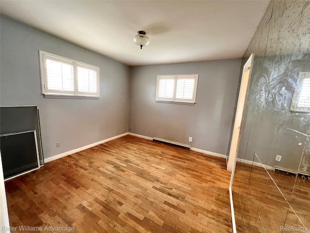 913 Cameron Ave, Pontiac, MI 48340 - empty room with wood finished floors and baseboards