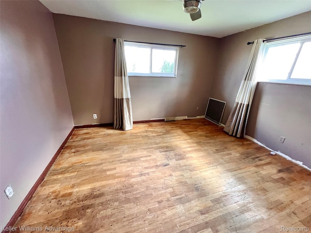 913 Cameron Ave, Pontiac, MI 48340 - spare room with light wood finished floors and ceiling fan