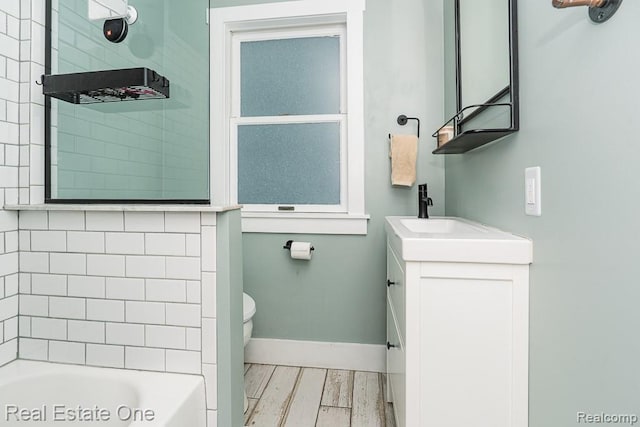 1388 W Troy St, Ferndale, MI 48220 - full bath with vanity, a tub, wood finished floors, and a shower