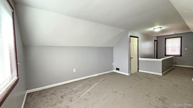 26495 Monticello St, Inkster, MI 48141 - additional living space with carpet floors and vaulted ceiling
