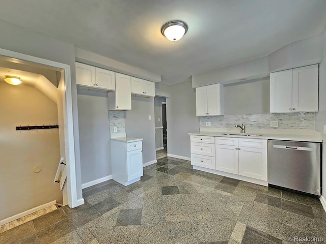 26495 Monticello St, Inkster, MI 48141 - kitchen with stainless steel dishwasher, granite floors, light countertops, white cabinetry, and tasteful backsplash