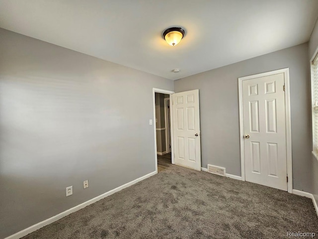 26495 Monticello St, Inkster, MI 48141 - unfurnished bedroom with carpet flooring and baseboards