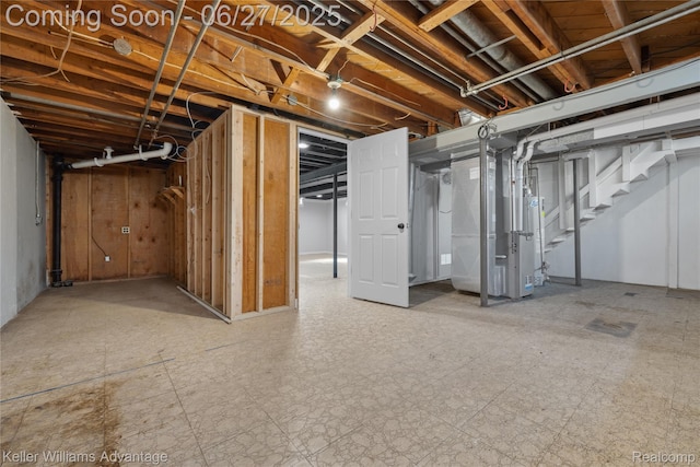 36669 Pinetree St, Livonia, MI 48150 - unfinished below grade area featuring stairs and heating unit