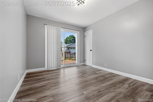 36669 Pinetree St, Livonia, MI 48150 - unfurnished room featuring wood finished floors and baseboards