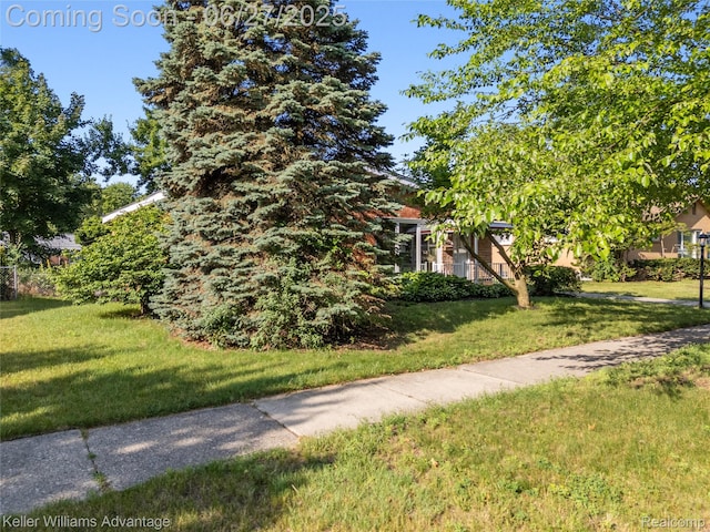 36669 Pinetree St, Livonia, MI 48150 - view of home's exterior featuring a lawn