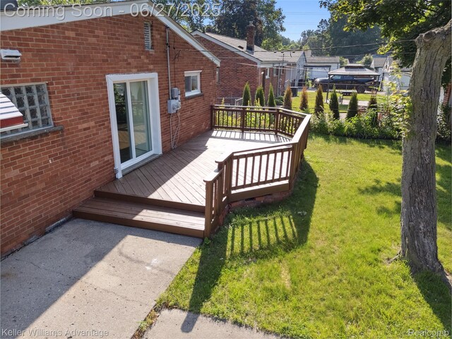 36669 Pinetree St, Livonia, MI 48150 - wooden deck with a lawn