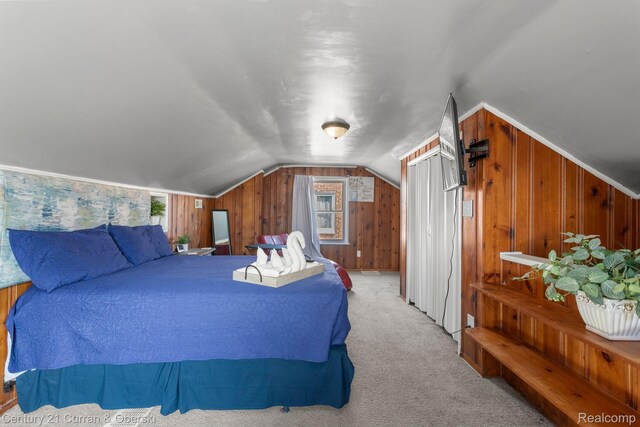 11670 Marlowe St, Detroit, MI 48227 - carpeted bedroom with multiple windows, vaulted ceiling, and wooden walls