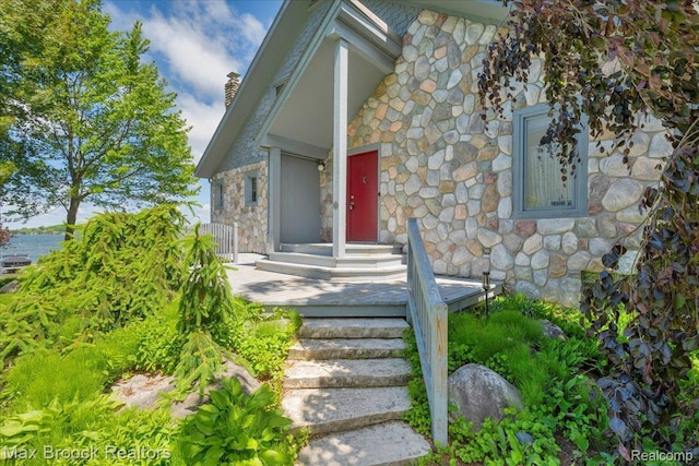 2222 Garland St, Sylvan Lake, MI 48320 - doorway to property featuring stone siding