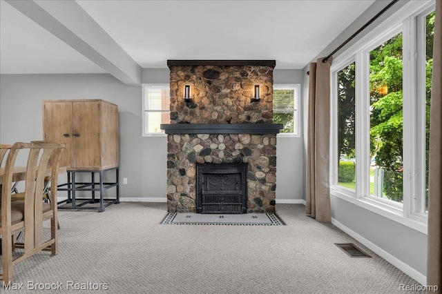 2222 Garland St, Sylvan Lake, MI 48320 - carpeted living area featuring plenty of natural light and a fireplace