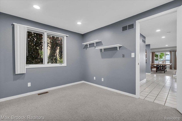 2222 Garland St, Sylvan Lake, MI 48320 - carpeted spare room with recessed lighting and tile patterned flooring