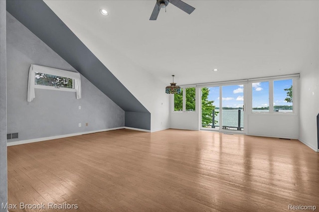 2222 Garland St, Sylvan Lake, MI 48320 - unfurnished living room with wood finished floors, a ceiling fan, and recessed lighting