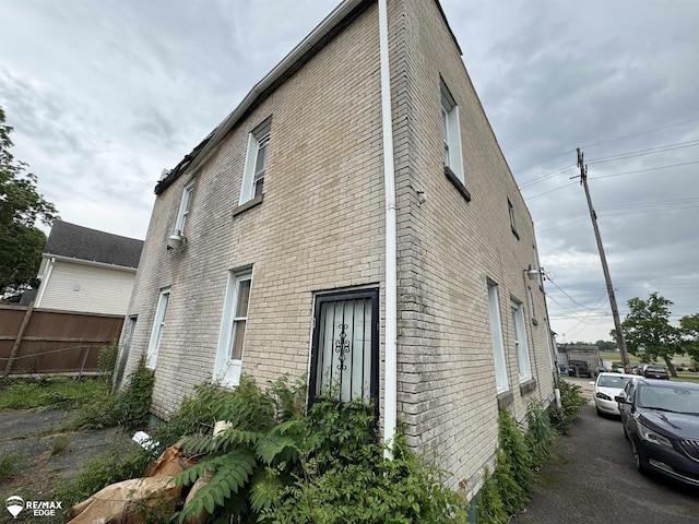 1409 2nd St, Flint, MI 48503 - view of side of home with brick siding