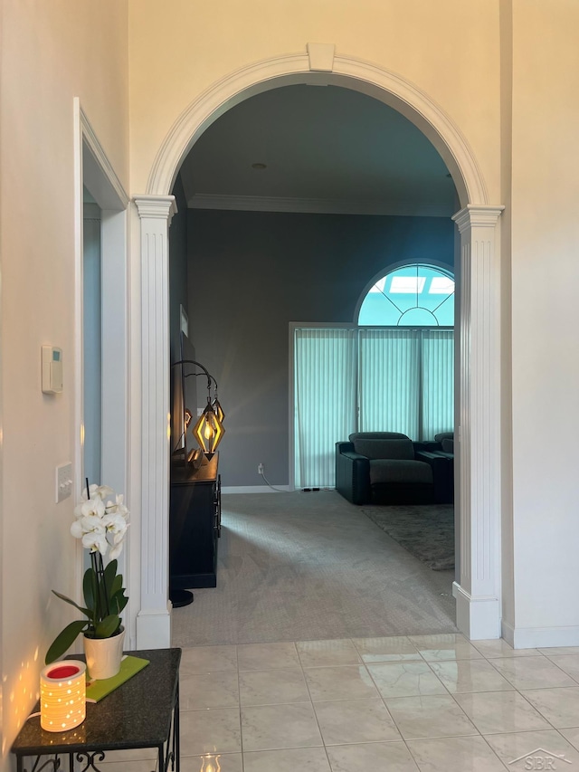 13 E Grove Ct, Freeland, MI 48623 - hall with decorative columns, arched walkways, carpet, and crown molding