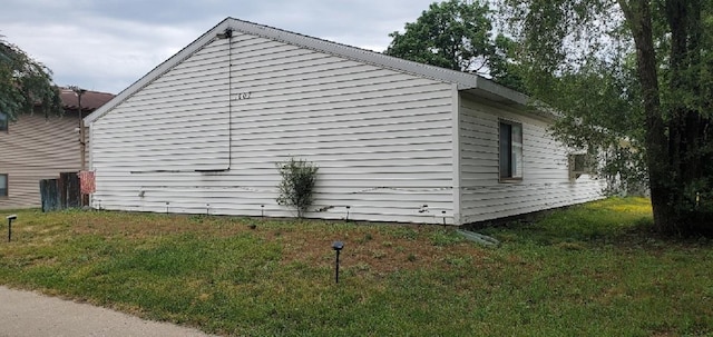 1000 W Lyons St, Mount Pleasant, MI 48858 - view of home's exterior with a yard