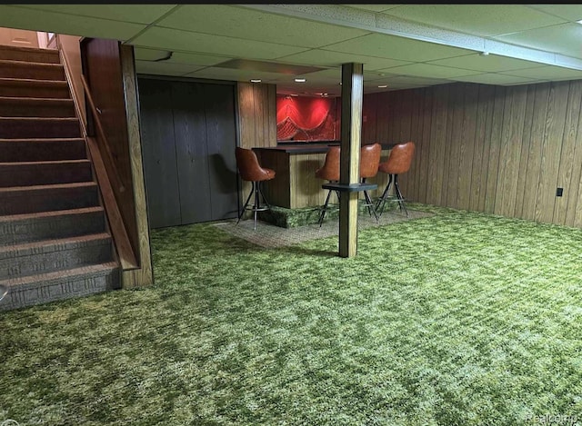24739 Blackmar Ave, Warren, MI 48091 - finished basement with carpet, a drop ceiling, a bar, stairway, and wood walls