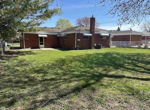24739 Blackmar Ave, Warren, MI 48091 - back of property with a chimney and brick siding