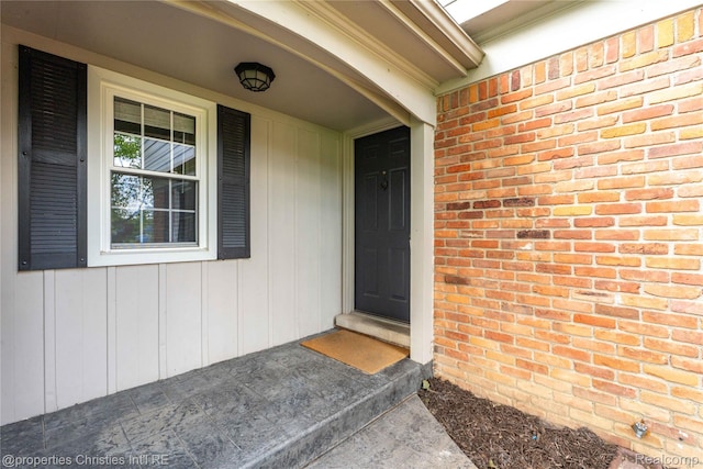 4770 Hedgewood Dr, Bloomfield Hills, MI 48301 - entrance to property featuring brick siding and board and batten siding